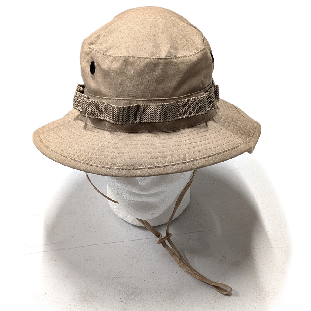 a mannequin wearing a khaki tan military boonie cover