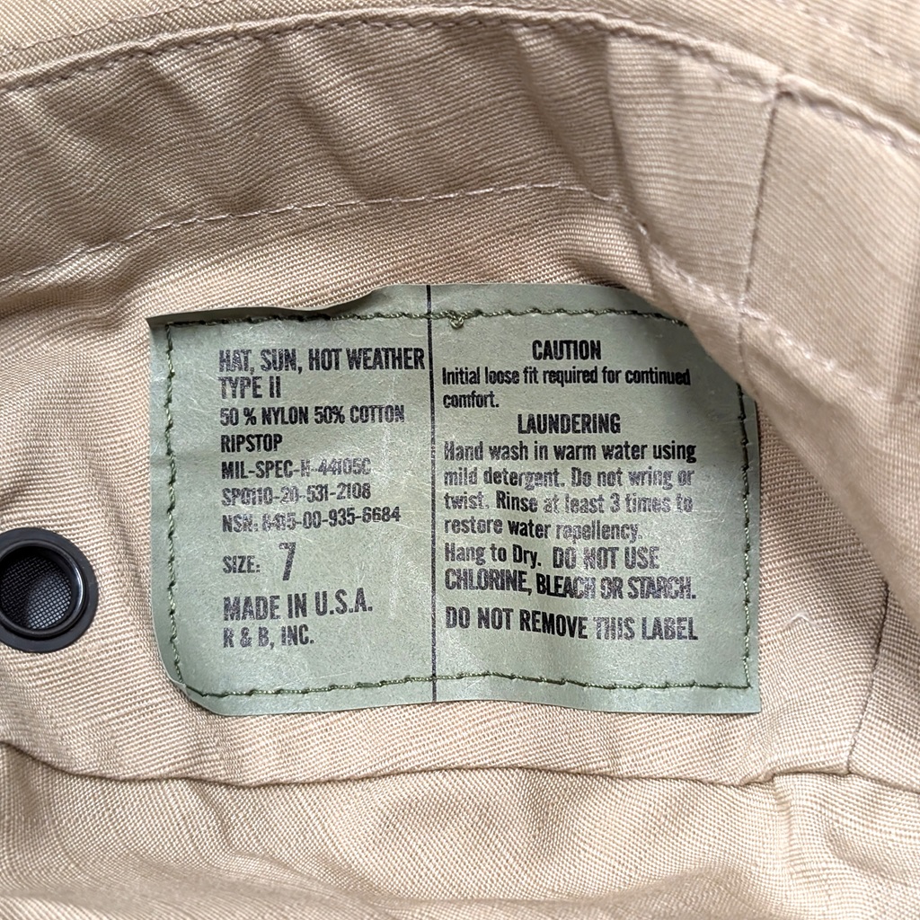 the tag on a USGI jungle hat