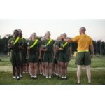 Marines wearing glow belts and skivvy shirts