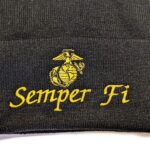 "Semper Fi" and a Marine Corps EGA embroidered with gold thread on a black beanie