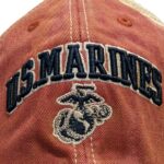a cardinal red vintage-look US Marines baseball hat with an embroidered EGA