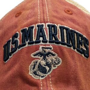 a cardinal red vintage-look US Marines baseball hat with an embroidered EGA