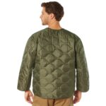 man wearing an olive drab military field jacket liner