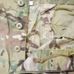 buttons on US Army MultiCam flame resistant trousers