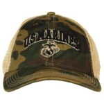 the front of a woodland camouflage and tan vintage-look US Marines baseball hat with an embroidered EGA