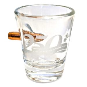a US Marine Corps 250th anniversary shot glass with a 308 bullet embedded into it
