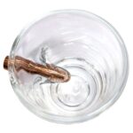 a US Marine Corps 250th anniversary shot glass with a 308 bullet embedded into it