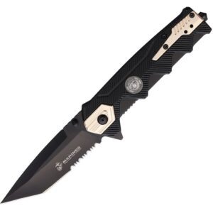 a black pocket knife with gold highlights with a US Marine Corps seal and a serrated blade with a tanto tip