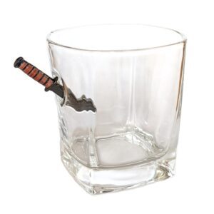 a US Marine Corps whiskey glass with a miniature KABAR combat utility knife replica sticking into the glass