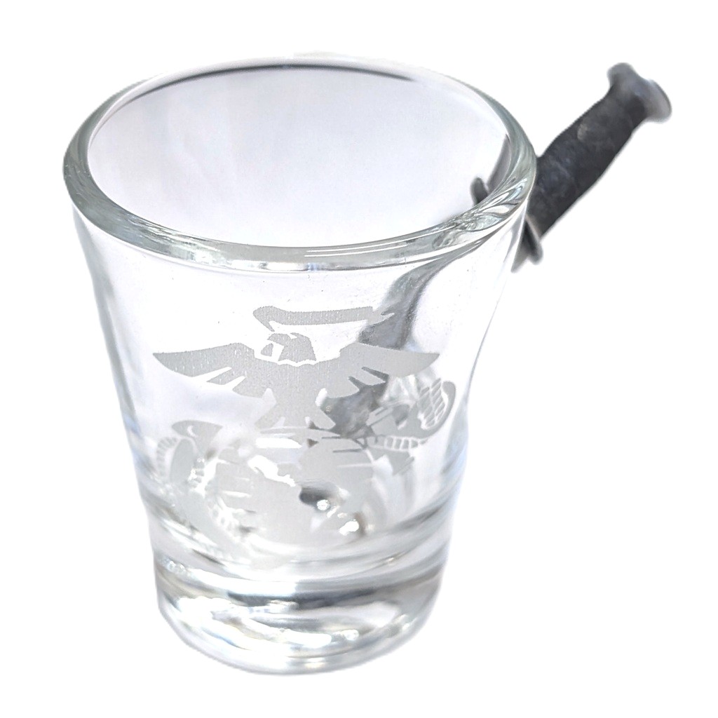 a US Marine Corps shot glass with an EGA and an embedded combat knife replica