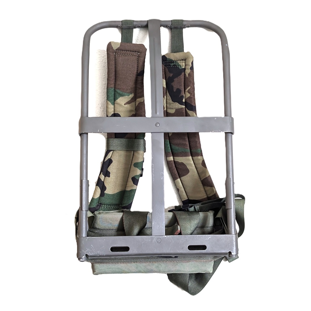 a US military ALICE pack field frame with M81 woodland camouflage straps and olive drab waist strap