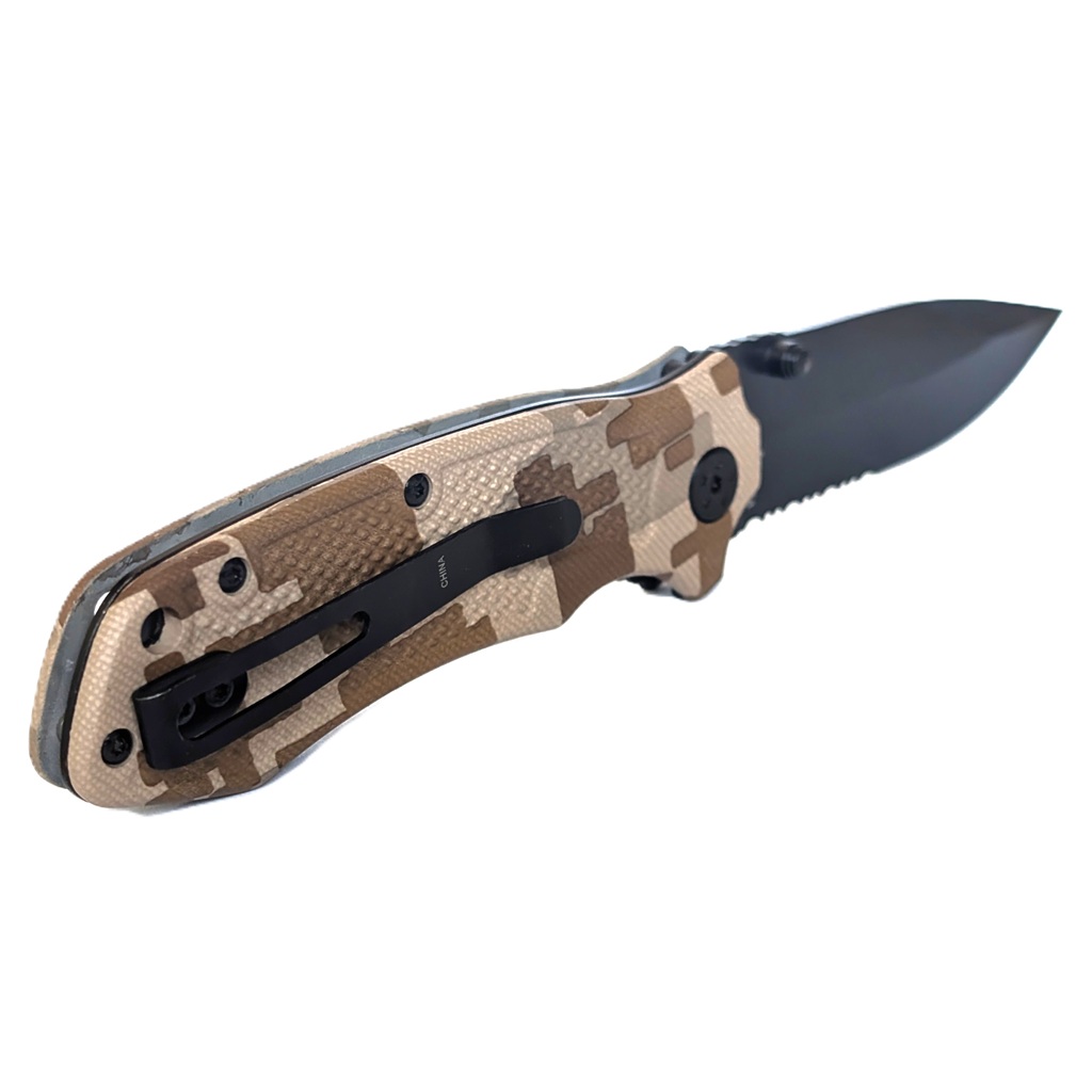 a US Marine Corps 250th anniversary commemorative pocket knife in desert MARPAT with a black blade
