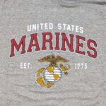 an oxford gray US Marine Corps hoodie with a vintage USMC logo